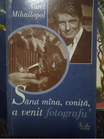 Sarut mana, conita, a venit fotografu'