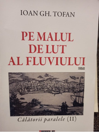 Pe malul de lut al fluviului