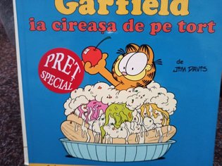 Garfield ia cireasa de pe tort